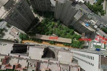 西安开发商闹市区盖数栋违建 且涉嫌私售土地获利逾千万元？