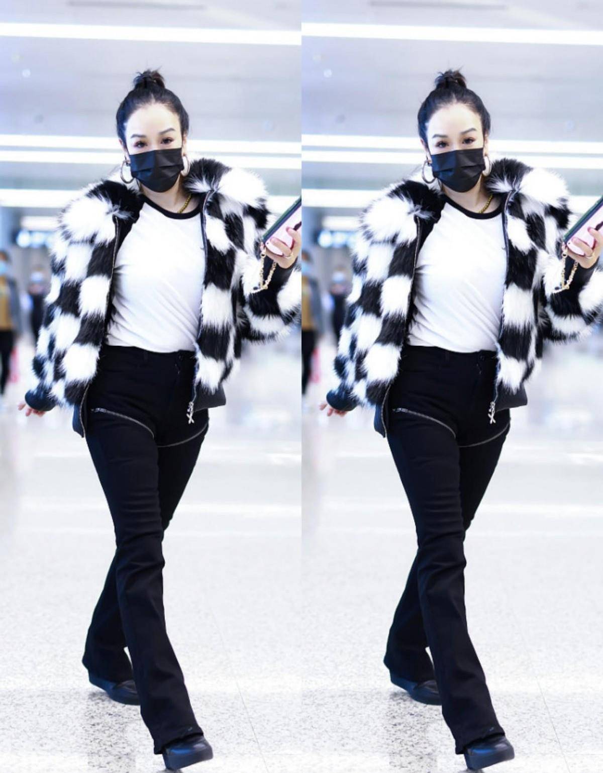 钟丽缇的马尾辫扎得太紧了,显得气质好凌厉,但开叉裙倒挺妩媚_造型