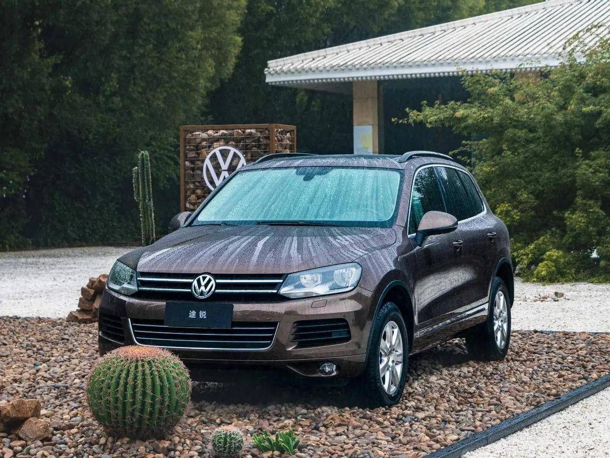 低调豪华suv演变史,大众途锐的20年_搜狐汽车_搜狐网