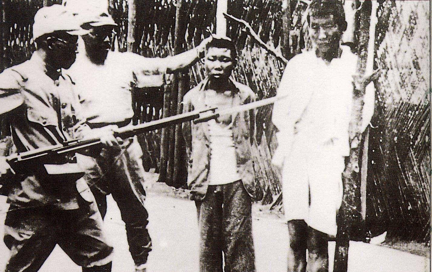 原创他屠杀5万同胞因一本相册才被迫认罪3枪打死9万百姓高呼