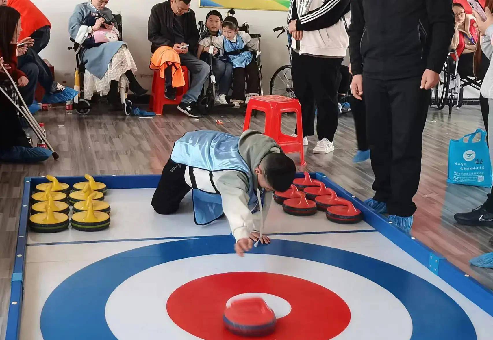 融入冰雪运动 共享健康我们:我市残疾人乐"竞"旱地冰壶_比赛_参赛选手