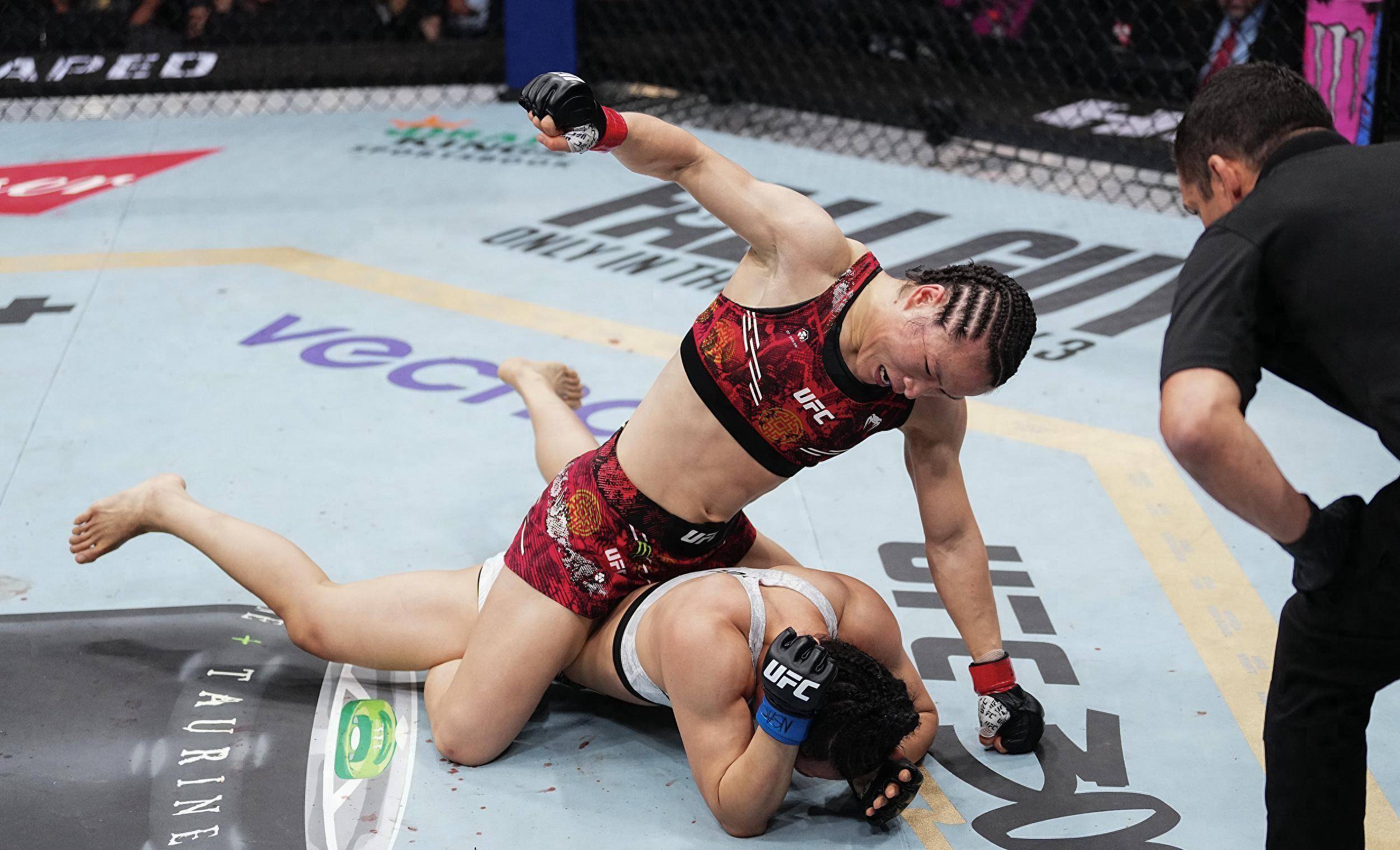 原创ufc金腰带战上演我们德比张伟丽卫冕女子草量级冠军