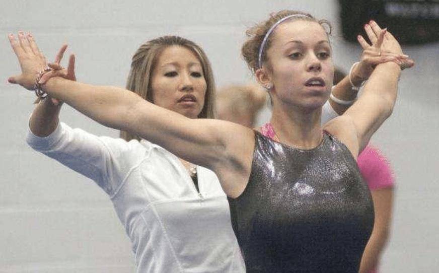 奥运冠军陆莉:16岁摘体操桂冠,18岁退役后嫁老外,生下一混血儿