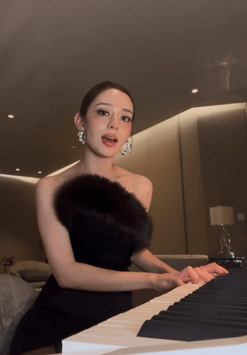 吉娜穿紧身裙勾勒曼妙身姿 戴墨镜气质优雅摩登