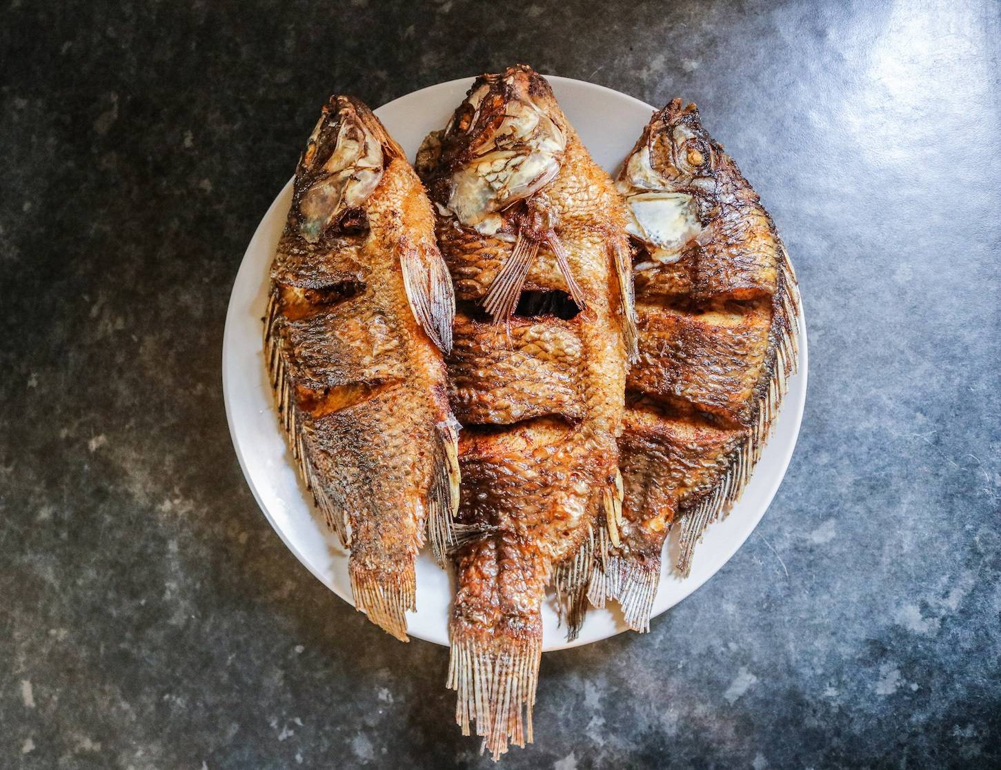 tilapia 羅非魚羅非魚是一種中小型魚類,它的外形,個體大小有點類似