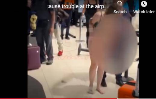 牙医情绪失控大闹机场 下身赤裸试图抢警枪_衣物_女子_朋友