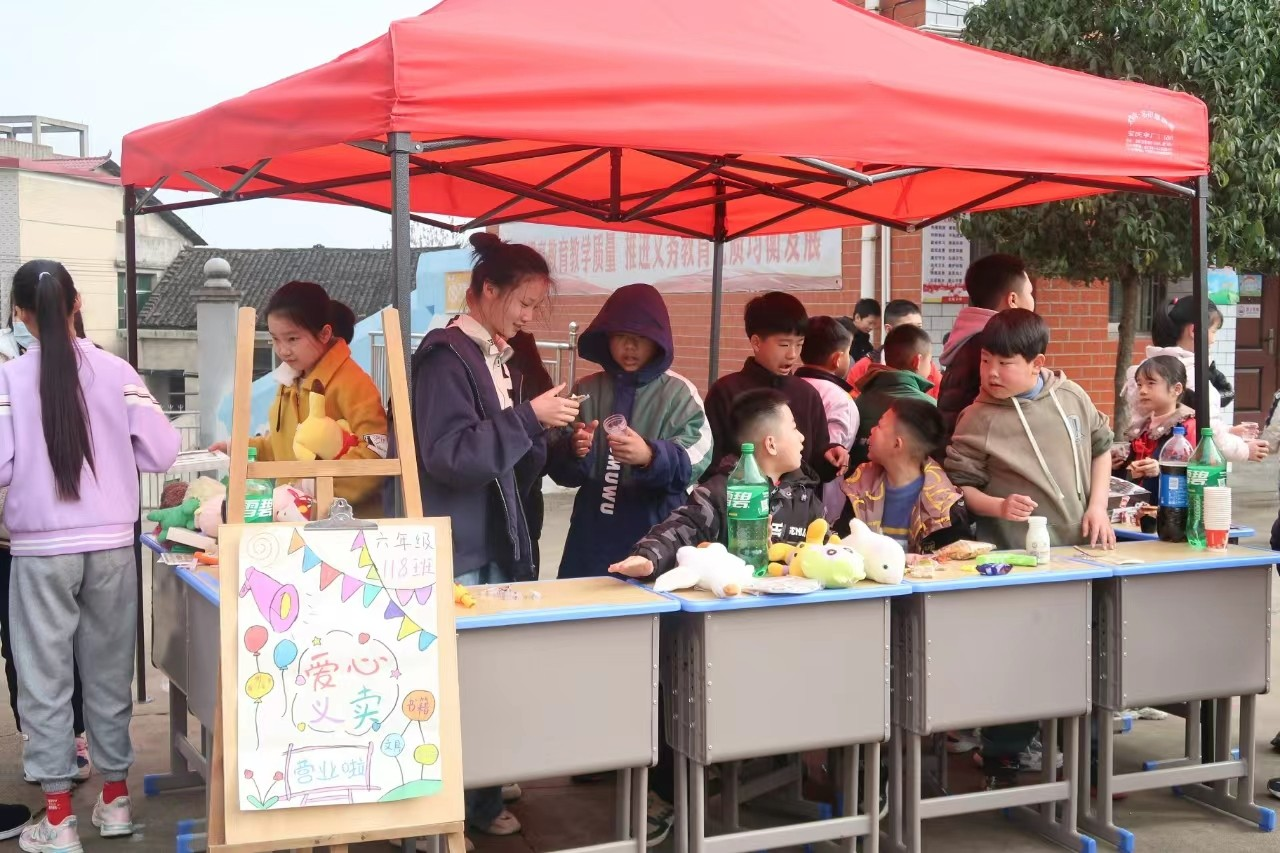 邵阳市北塔区民族团结一家亲雷锋义卖暖人心