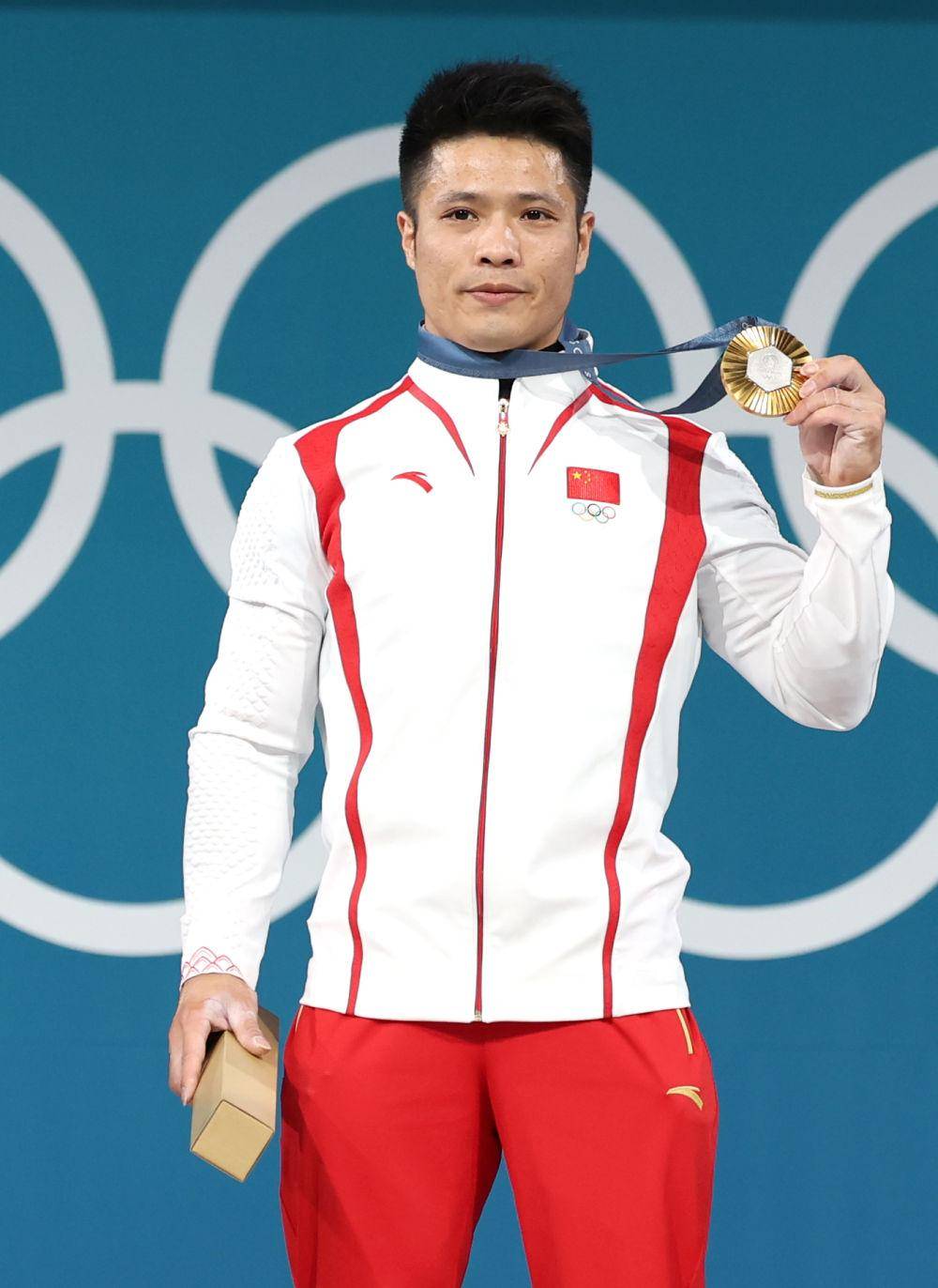 卫冕成功!李发彬夺得举重男子61公斤级冠军